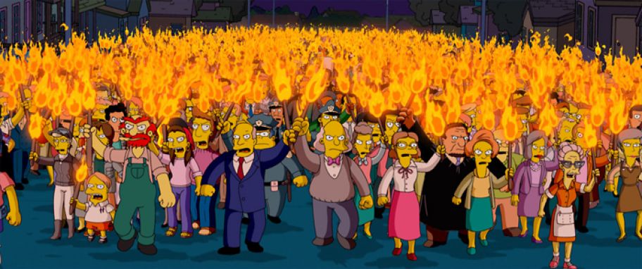 Szene aus "Die Simpsons - Der Film": Der wütende Mob auf dem Weg zu den Simpsons