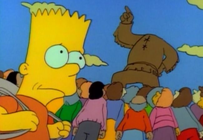 Bart steht mit schuldbewußter Miene vor der enthaupteten Statue von Jebediah Springfield.