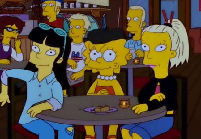 Lisa sitzt mit ihren neuen Freunden vom College in einer Bar.