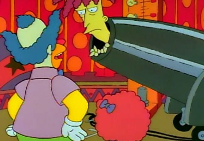 Krusty schießt Tingeltangel-Bob für einen Sketch aus der Kanone.